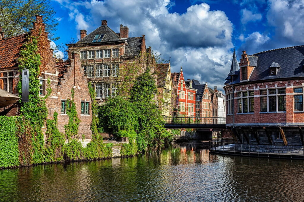 Historic brick buildings and canal in the old town of Ghent, Belgium