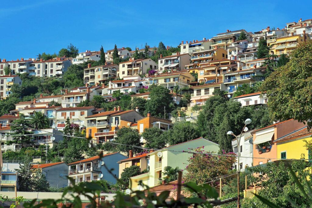 Hillside homes and apartments above Rabac Bay in Croatia