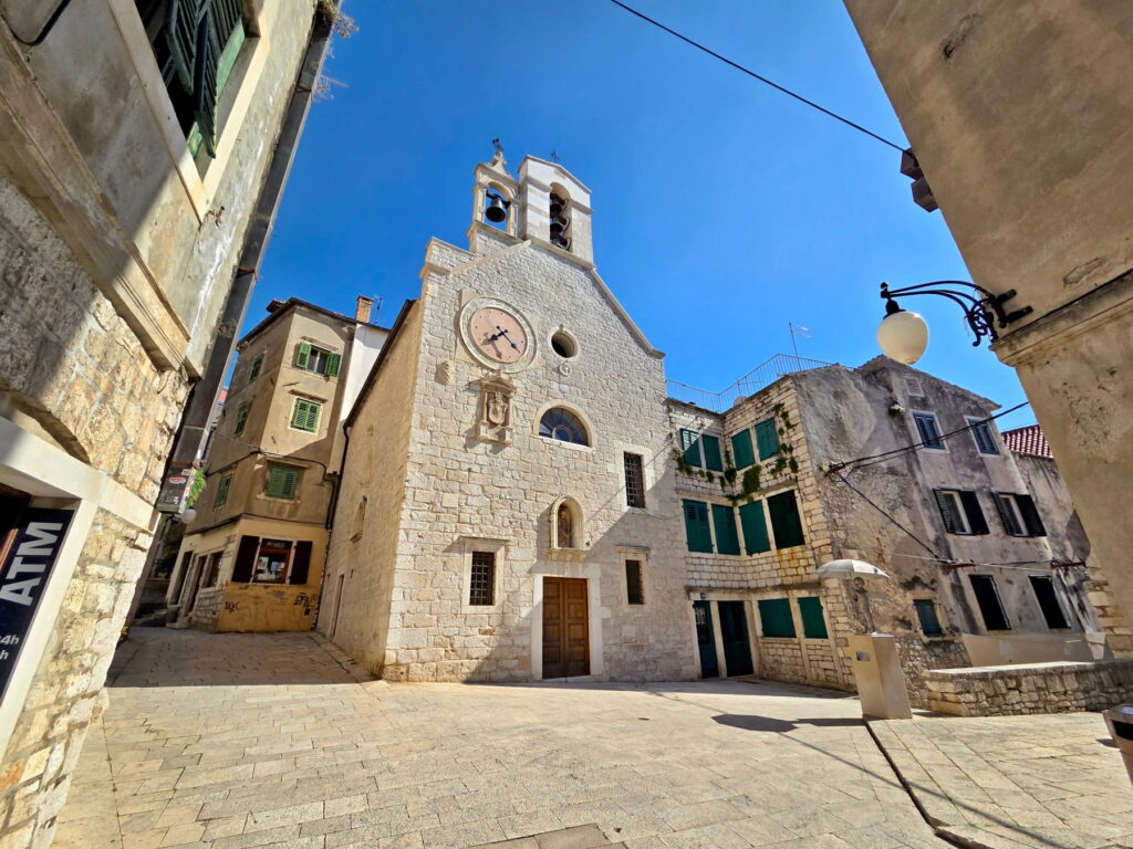 Stone church and old buildings in Šibenik old town, Croatia