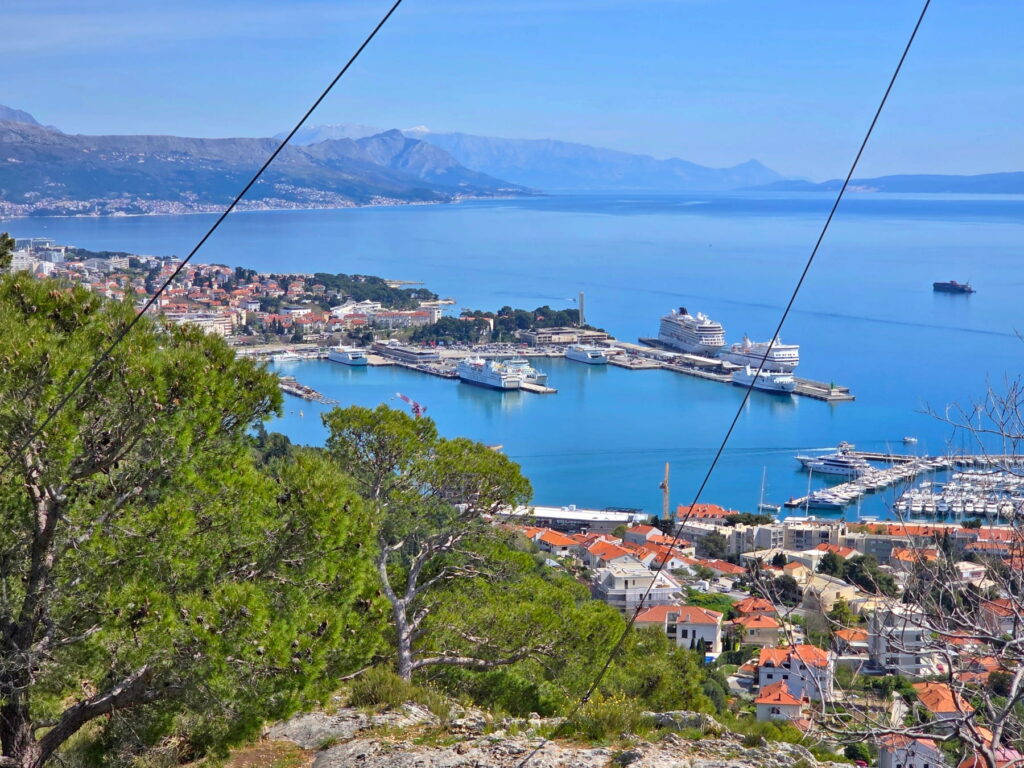 Panoramic view of Split harbor and Adriatic coastline from above.