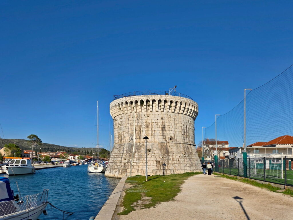 Round medieval tower on the waterfront in Trogir, Croatia