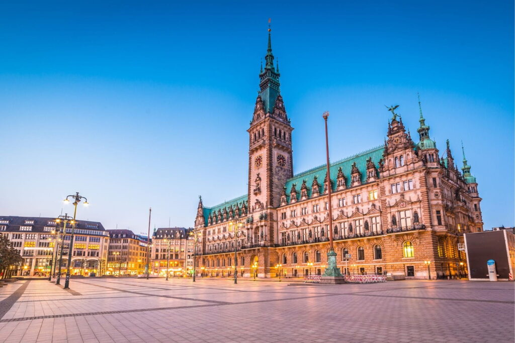 Hamburg Town Hall illuminated at dusk in Hamburg, Germany