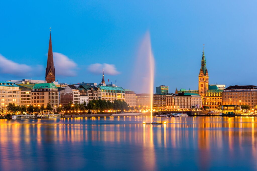 Evening skyline of Binnenalster Lake and Hamburg city center in Germany