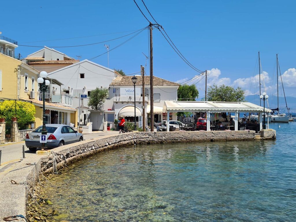 Waterfront promenade and clear sea in Kassiopi, Corfu, Greece