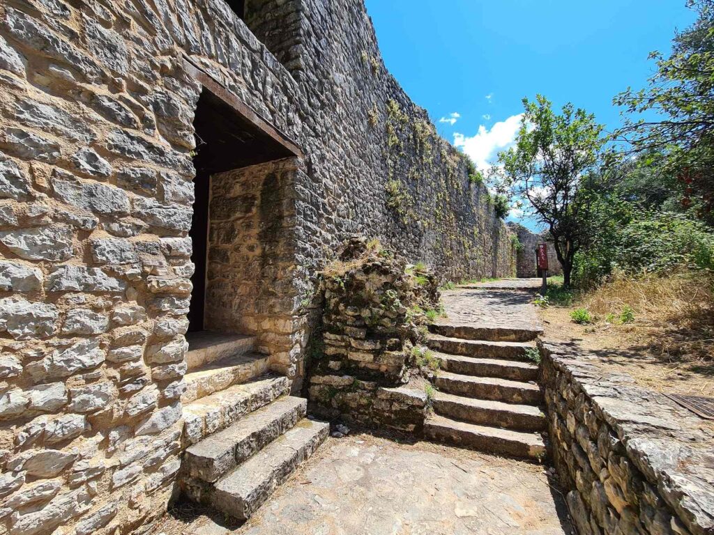 Stone pathway and entrance inside Kassiopi Castle in Corfu, Greece