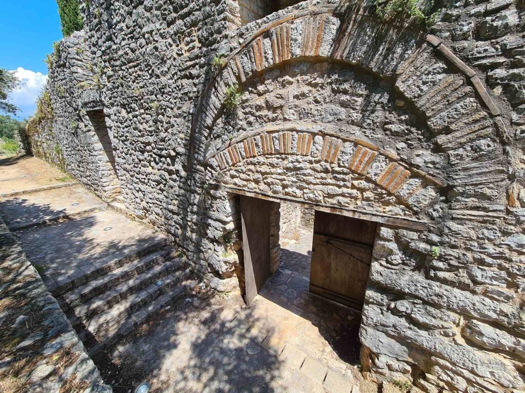 Historic stone archway at Kassiopi Castle in Corfu, Greece