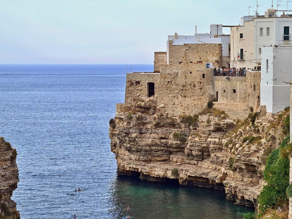 Historic cliff houses above the Adriatic Sea in Polignano a Mare, Italy