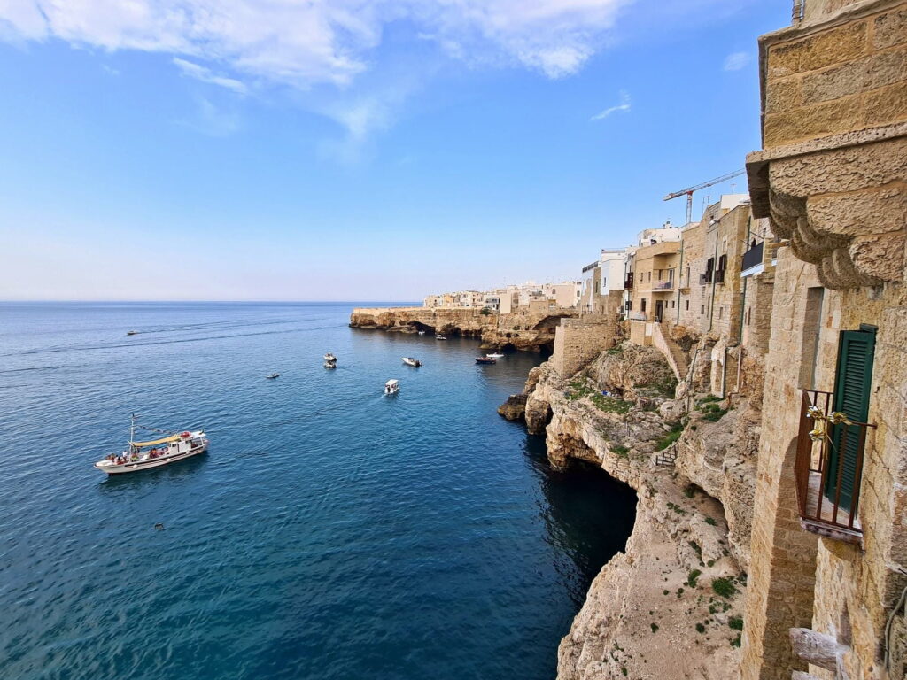Adriatic coastline and cliffside homes in Polignano a Mare, Italy
