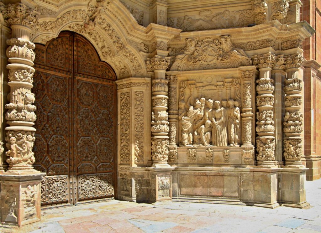 Decorative doorway and stone sculptures at Astorga Cathedral in Spain.