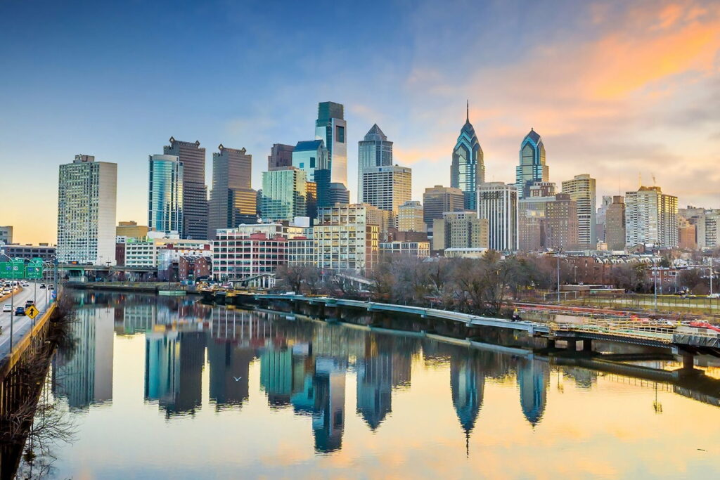 Philadelphia skyline reflected in the Schuylkill River at sunset, USA
