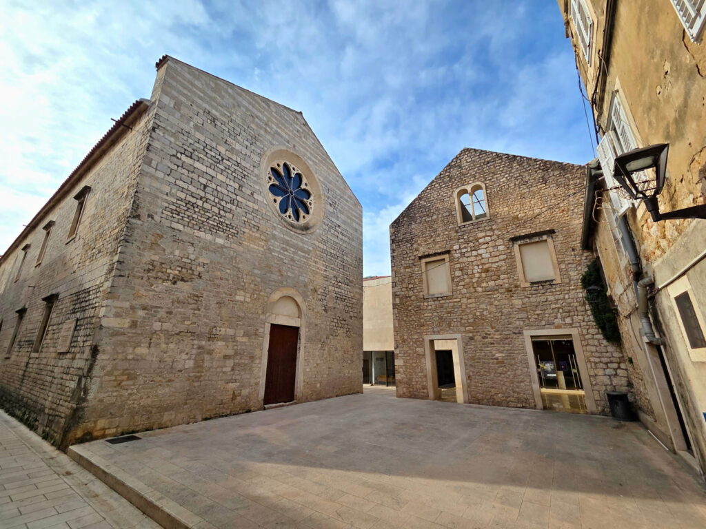 Stone church and quiet square in Zadar historic center, Croatia